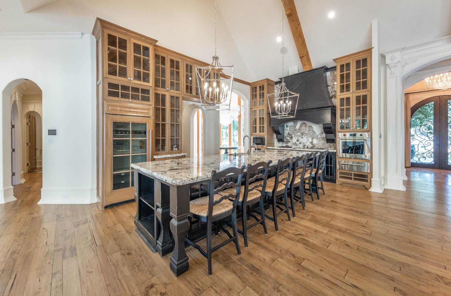 201 Juniper Drive Lamesa, TX 79331 - Photo 8 of 45 an open kitchen with wooden floor and furniture