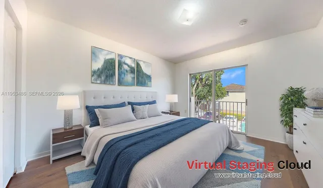 a bedroom with bed and a window