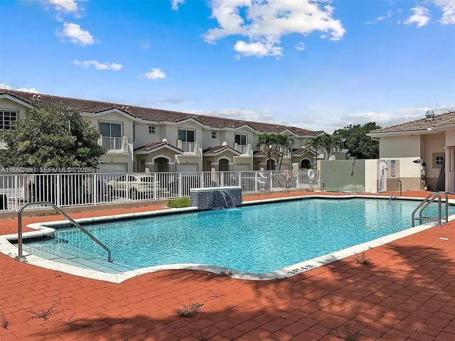 a view of a house with a big yard