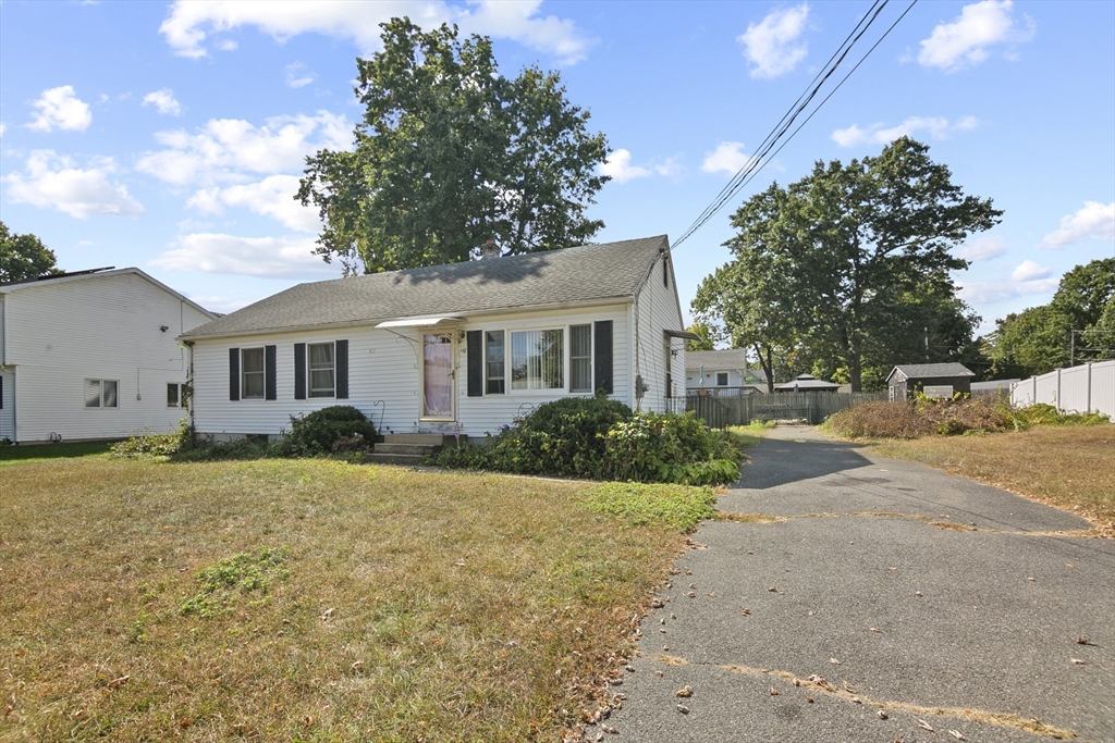 110 Tilton Street Springfield, MA 01109 - Photo 1 of 23 a front view of a house with a yard