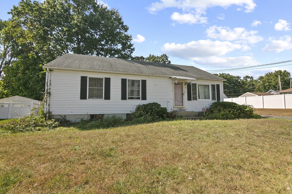 110 Tilton Street Springfield, MA 01109 - Photo 2 of 23 a view of a house with a backyard