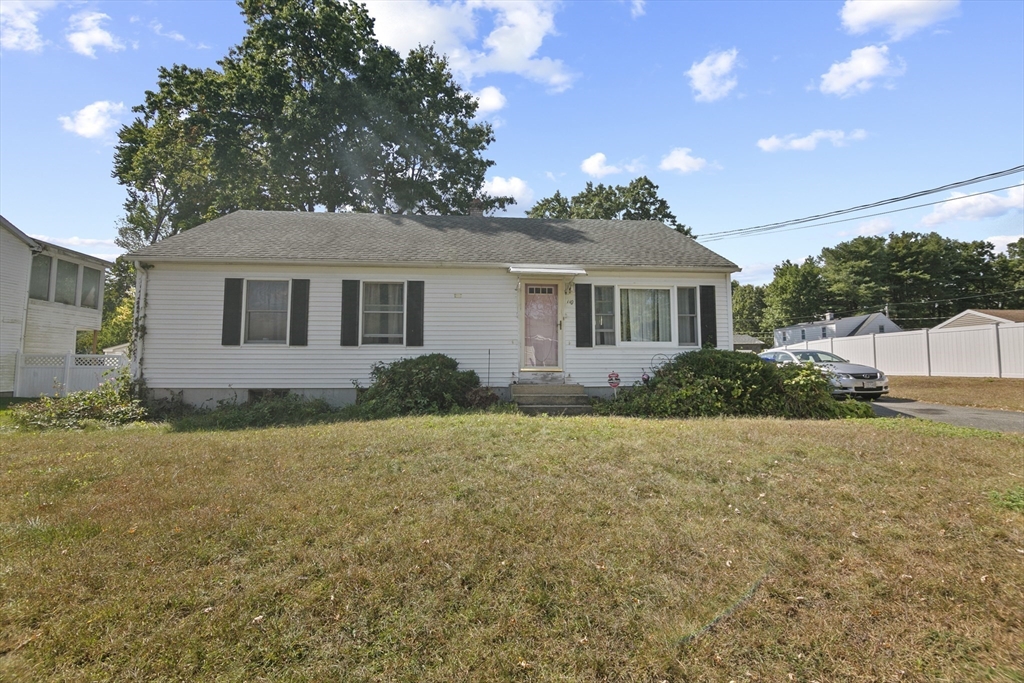 110 Tilton Street Springfield, MA 01109 - Photo 23 of 23 a front view of a house with a yard