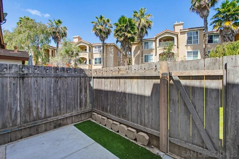 5130 North River Road, Unit B Oceanside, CA 92057 - Photo 39 of 51 a front view of a house with a garden