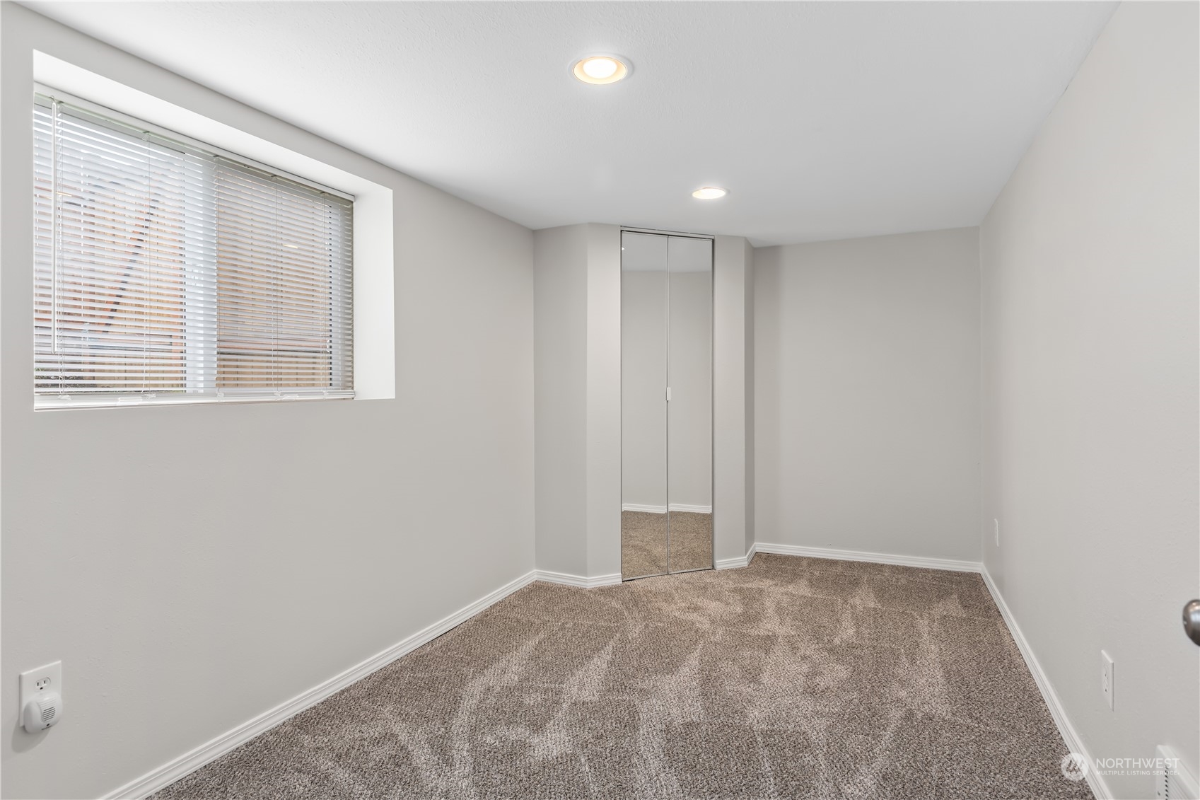 6820 Lower Ridge Road Everett, WA 98203 - Photo 17 of 27 an empty room with a window