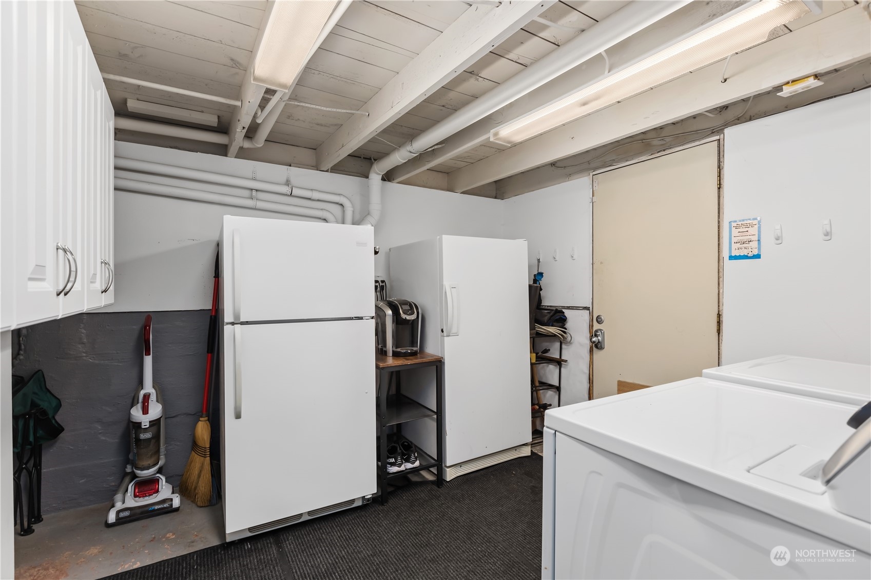 6820 Lower Ridge Road Everett, WA 98203 - Photo 19 of 27 a utility room with refrigerator and washer