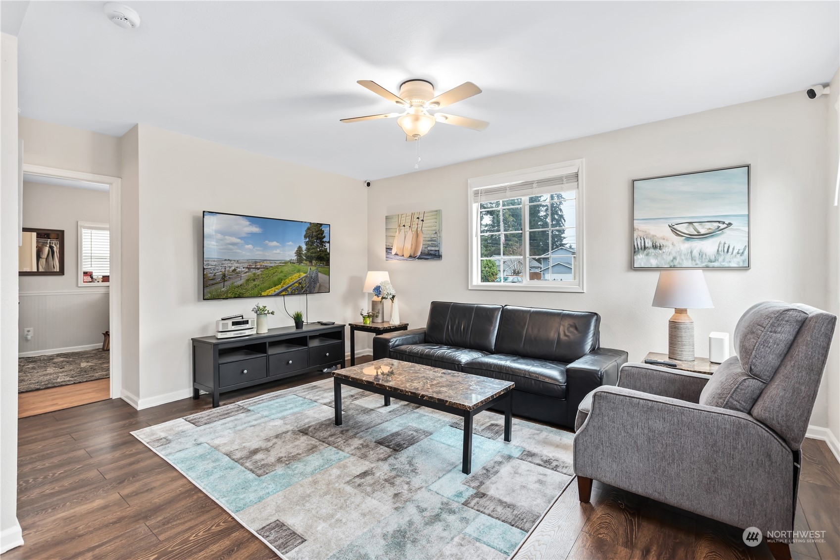 6820 Lower Ridge Road Everett, WA 98203 - Photo 4 of 27 a living room with furniture and a flat screen tv