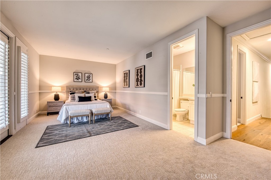15 Tortoise Shell Coto de Caza, CA 92679 - Photo 20 of 35 a living room with furniture a rug and a window