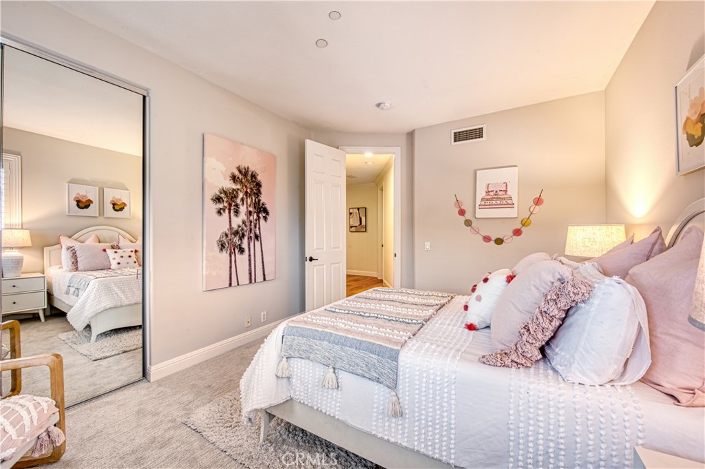 15 Tortoise Shell Coto de Caza, CA 92679 - Photo 24 of 35 a bedroom with a bed and a couch