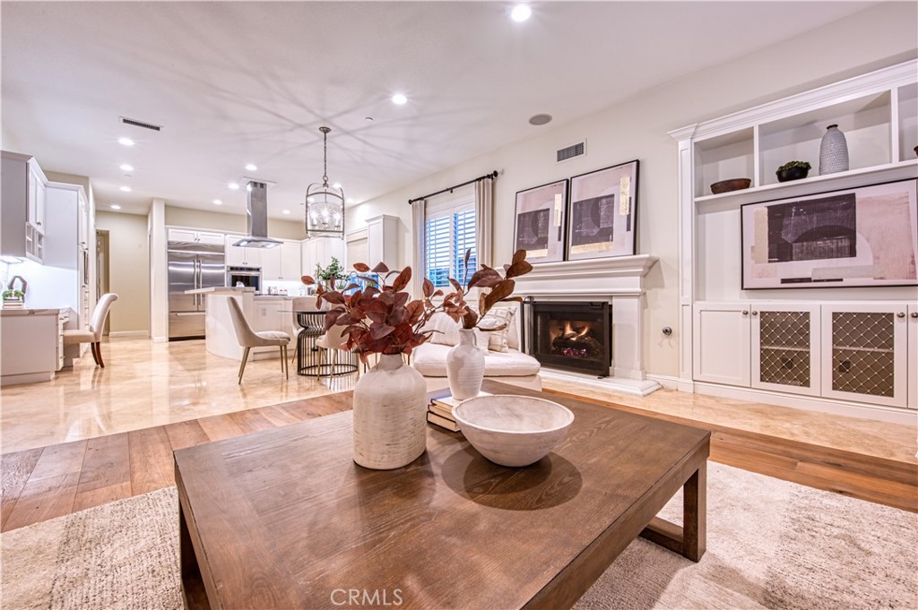 15 Tortoise Shell Coto de Caza, CA 92679 - Photo 5 of 35 a dining room with furniture and a fireplace