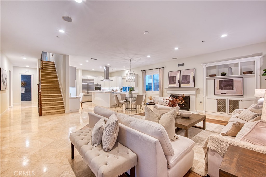 15 Tortoise Shell Coto de Caza, CA 92679 - Photo 8 of 35 a living room with furniture white walls and kitchen view