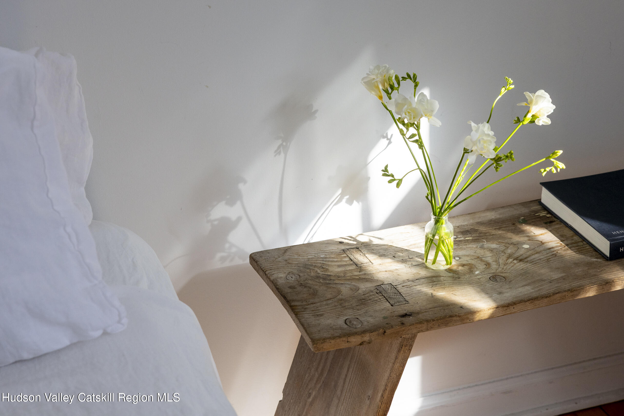 188 Mt Merino Road Hudson, NY 12534 - Photo 13 of 37 a vase of flowers sitting on a table