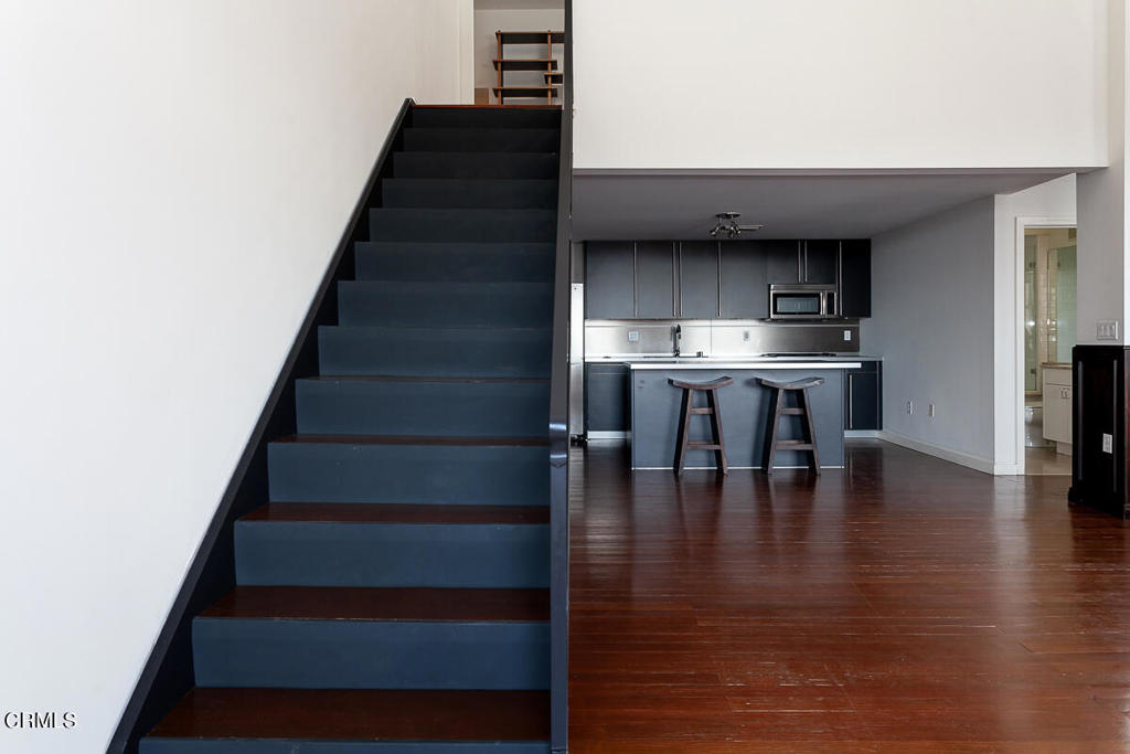 257 South Spring Street, Unit PHE Los Angeles, CA 90012 - Photo 16 of 32 a view of entryway and hall with wooden floor