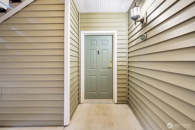 a view of a car park in front of a building