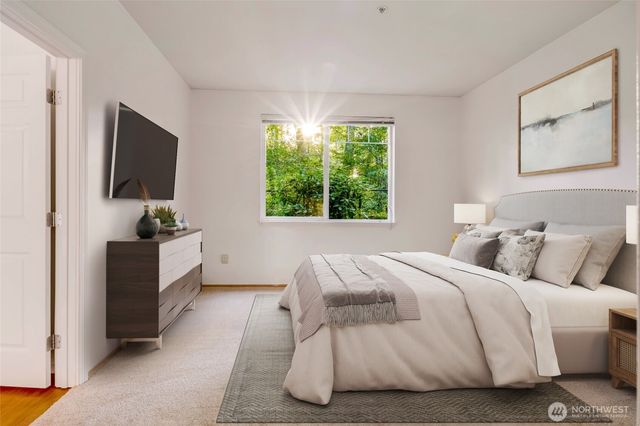 a bathroom with a sink toilet and a mirror
