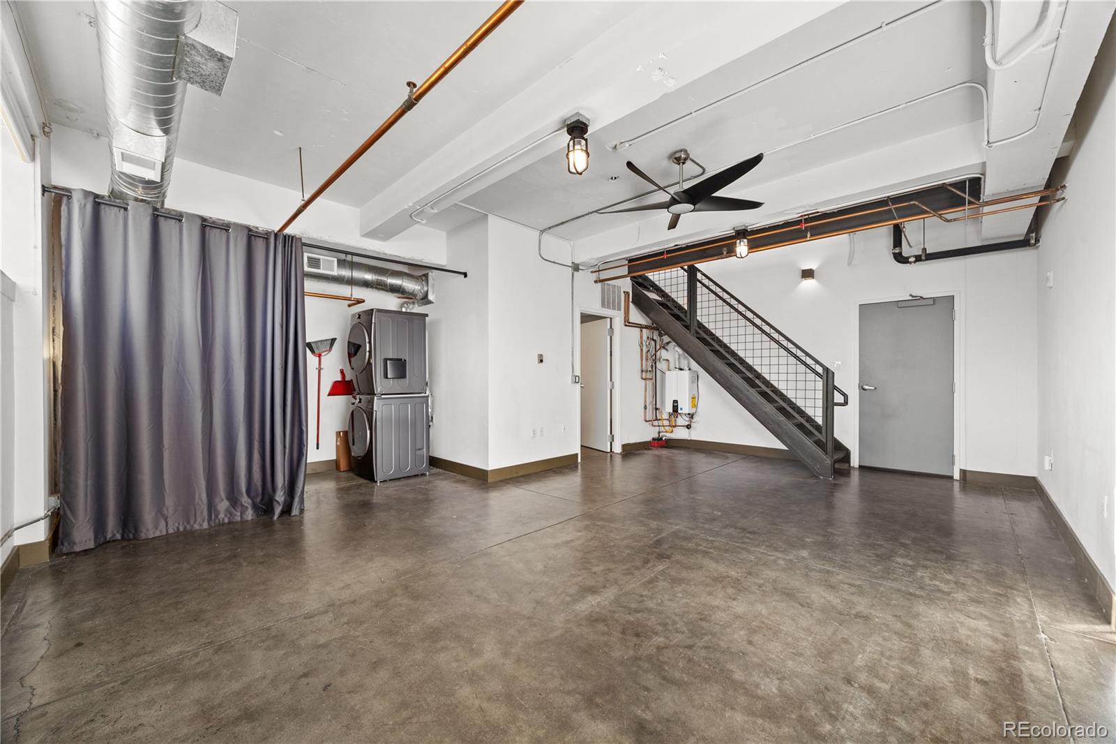 1777 East 39th Avenue, Unit 205 Denver, CO 80205 - Photo 8 of 13 wooden floor in an empty room