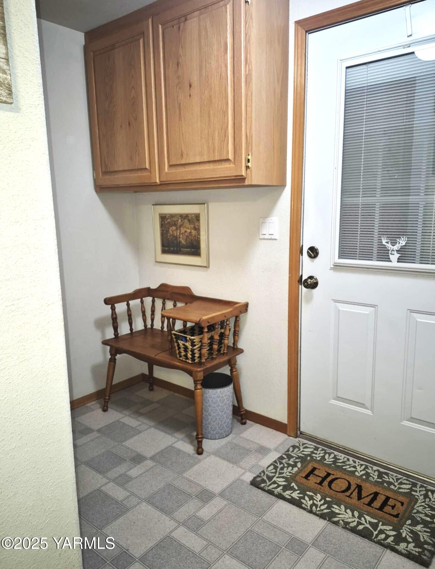 2490 Thompson Road Cowiche, WA 98923 - Photo 31 of 62 a bench sitting in a kitchen next to a cabinet