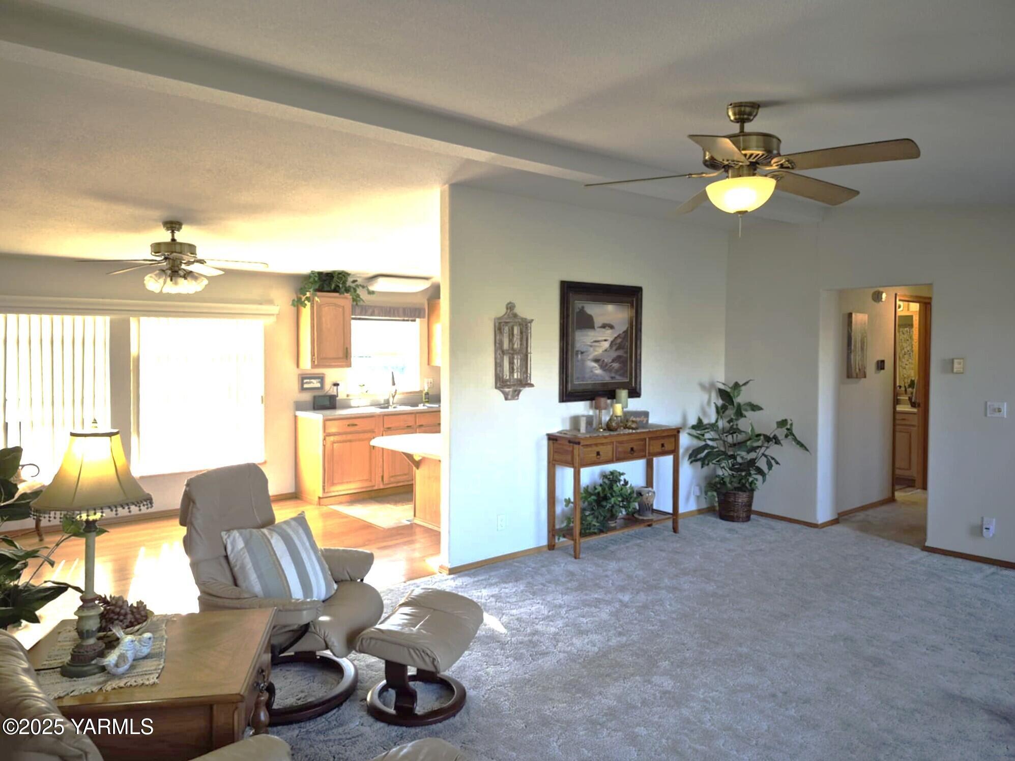 2490 Thompson Road Cowiche, WA 98923 - Photo 36 of 62 a living room with furniture and a chandelier