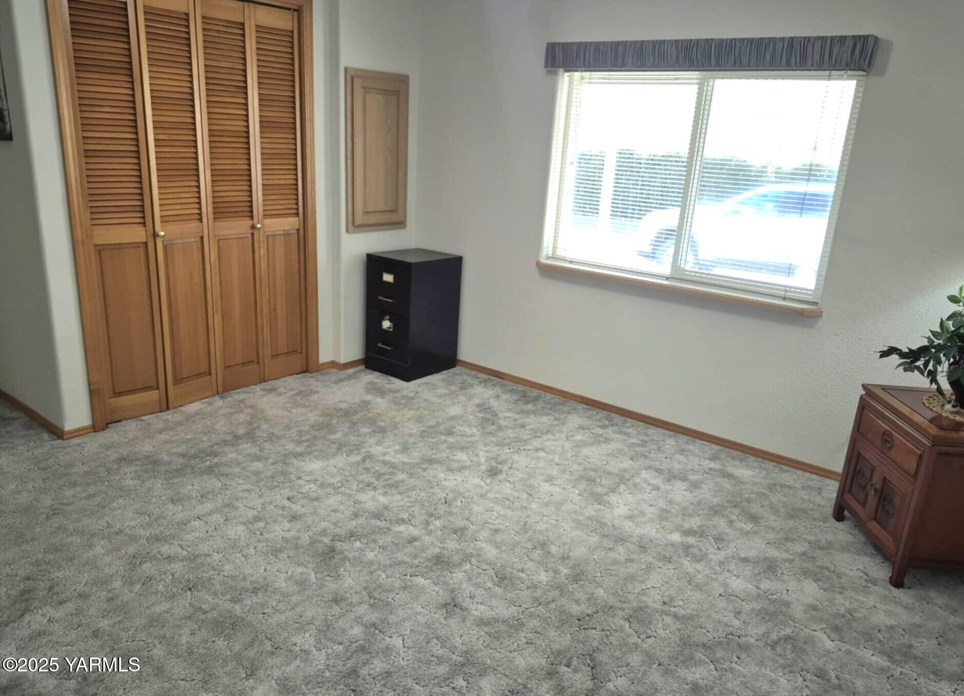 2490 Thompson Road Cowiche, WA 98923 - Photo 41 of 62 a view of an empty room with a window