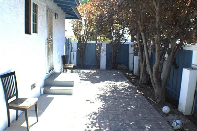 a view of a back yard of the house