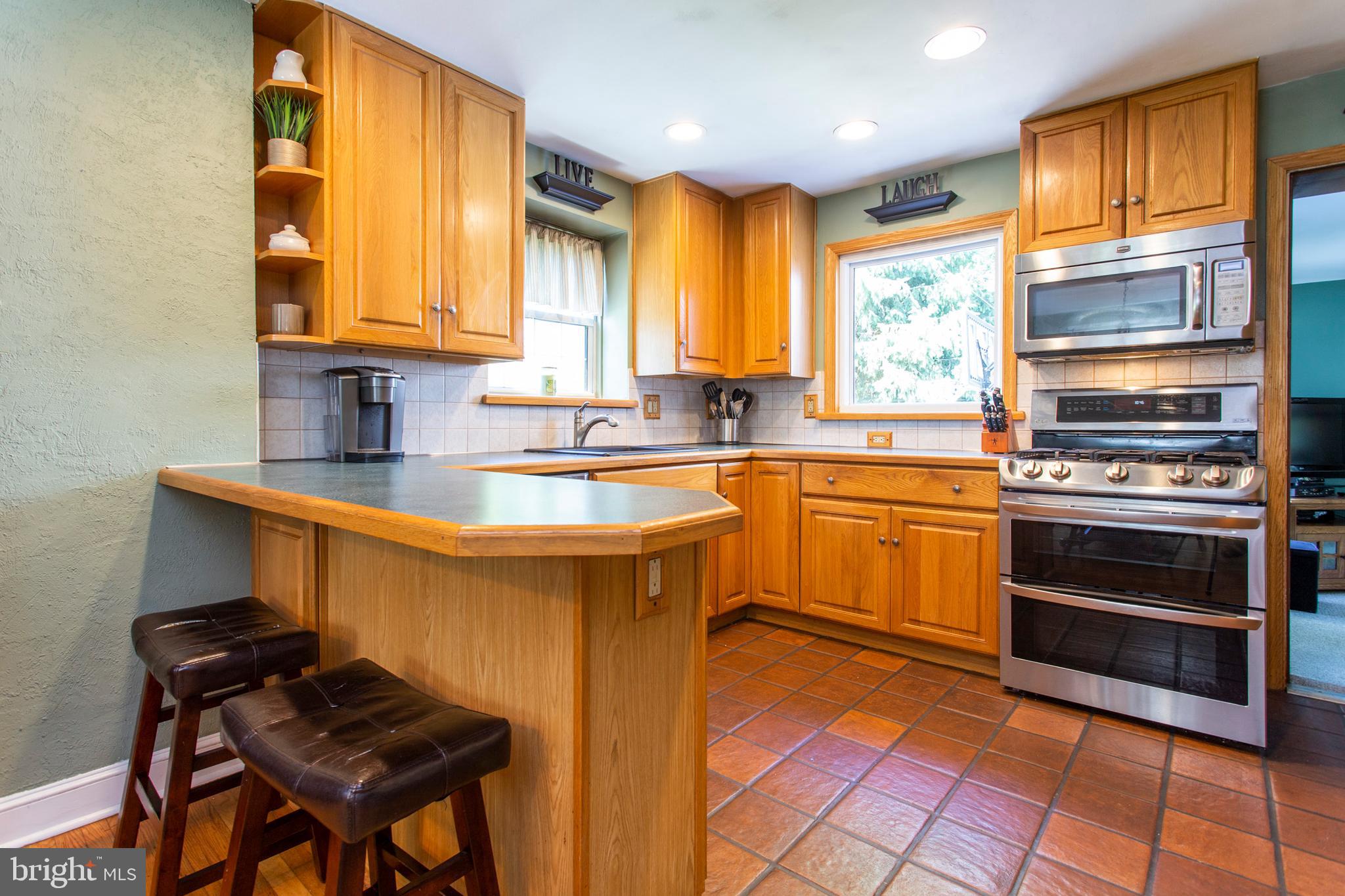 202 Midland Road Springfield, PA 19064 - Photo 7 of 17 Kitchen with Breakfast Bar