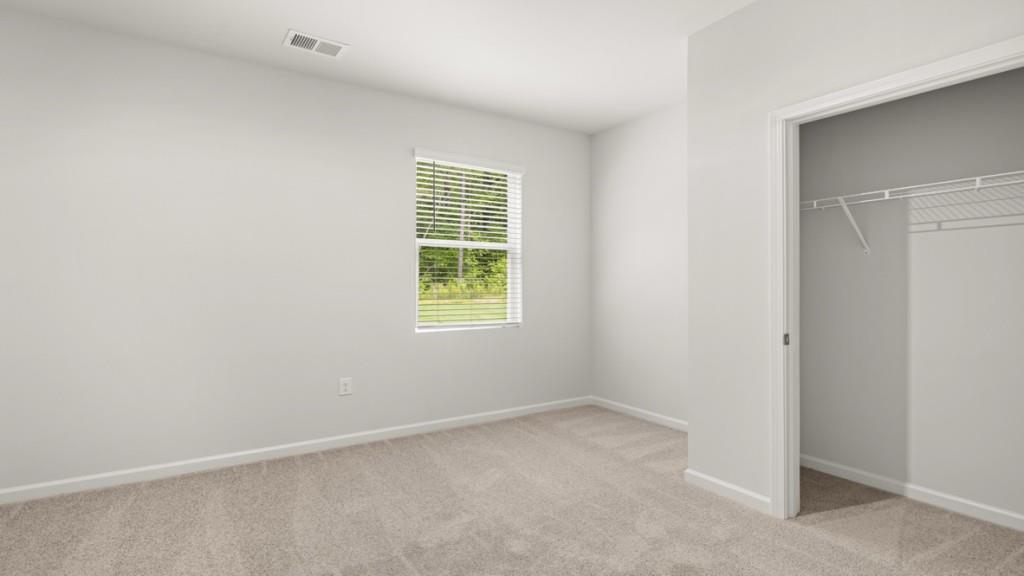 101 Hill Side Road Dallas, GA 30157 - Photo 11 of 31 an empty room with a window