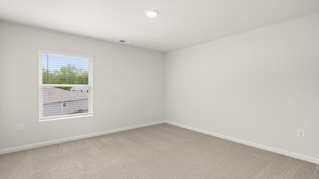 101 Hill Side Road Dallas, GA 30157 - Photo 20 of 31 an empty room with windows