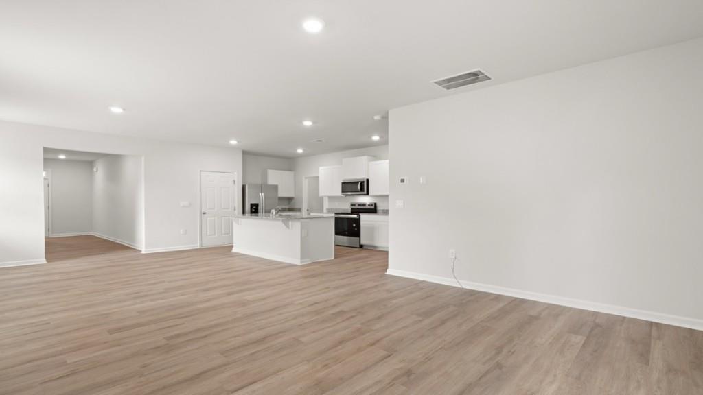 101 Hill Side Road Dallas, GA 30157 - Photo 10 of 31 a view of kitchen with wooden floor