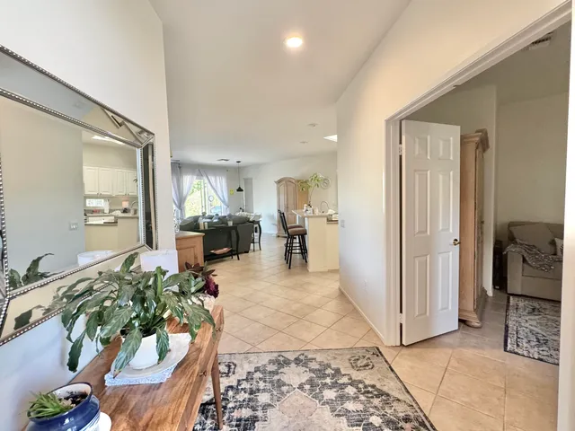 a living room with furniture and a table