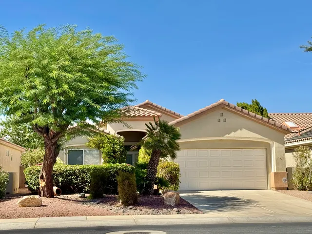 front view of a house with a street
