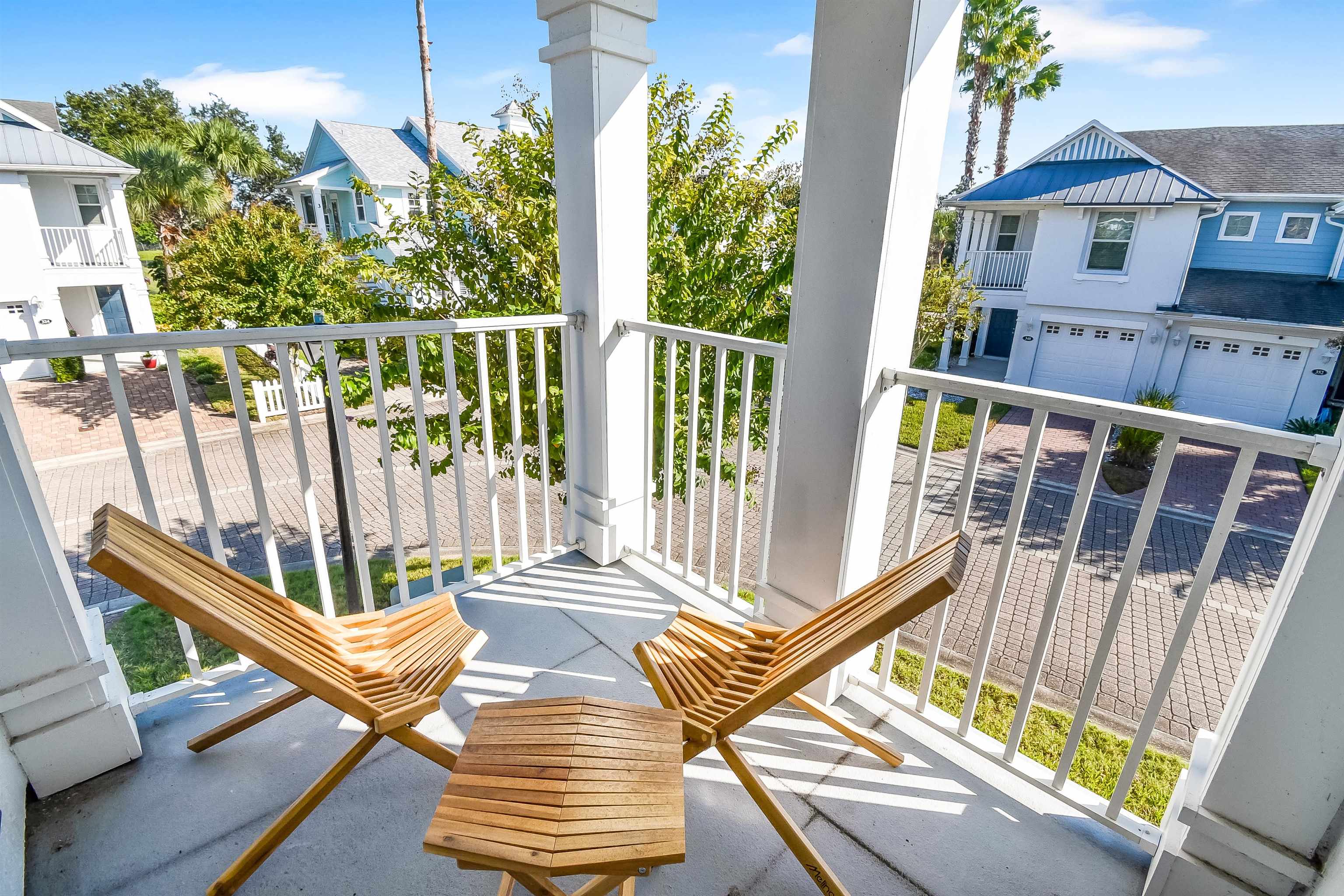 323 Islander Circle St. Augustine, FL 32080 - Photo 29 of 36 a view of a two chairs in the balcony