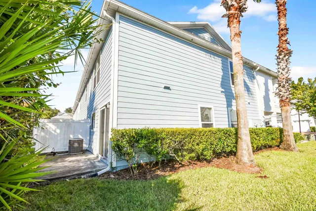 a view of a backyard with plants