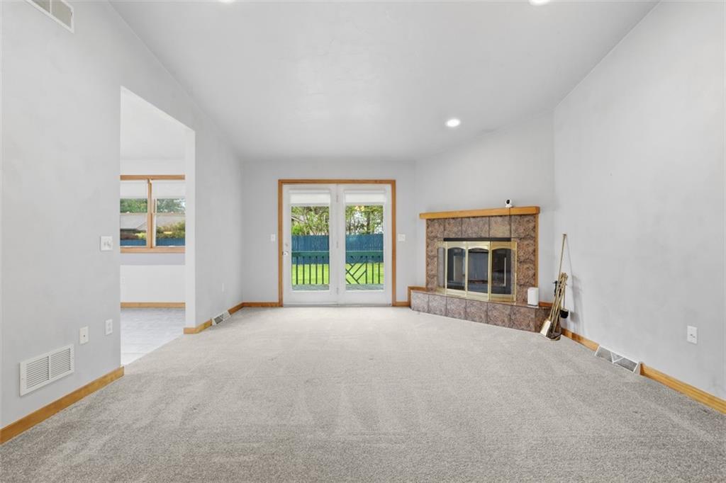 2757 Edith Street Lower Burrell, PA 15068 - Photo 12 of 48 French doors to back yard. Recessed lighting over the fireplace.