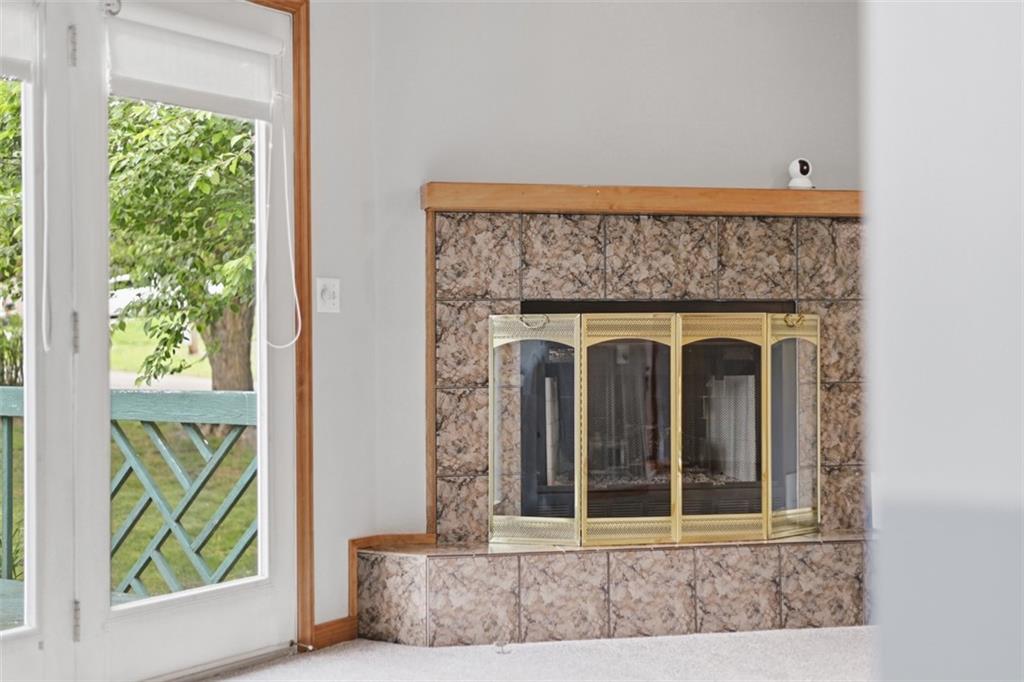 2757 Edith Street Lower Burrell, PA 15068 - Photo 16 of 48 View of gas fireplace and french door.