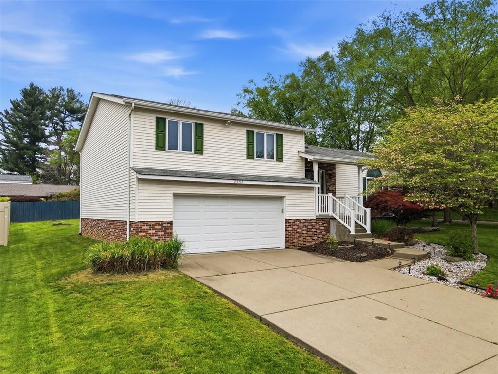2757 Edith Street Lower Burrell, PA 15068 - Photo 40 of 48 Side view with concrete driveway.
