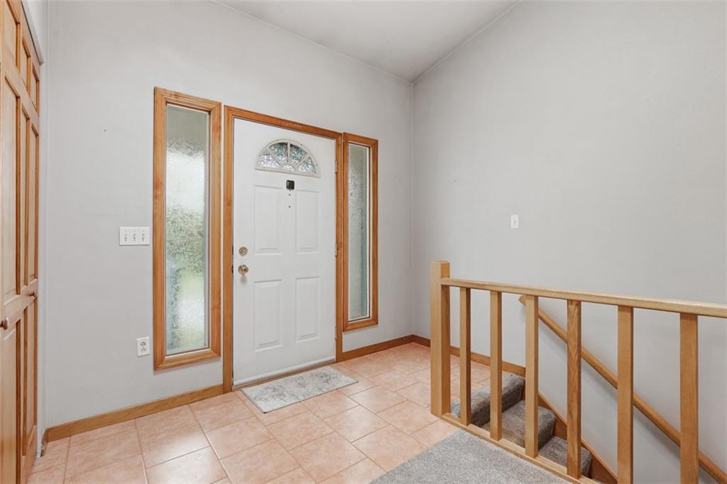 2757 Edith Street Lower Burrell, PA 15068 - Photo 4 of 48 Front door entry with ceramic flooring and coat closet.