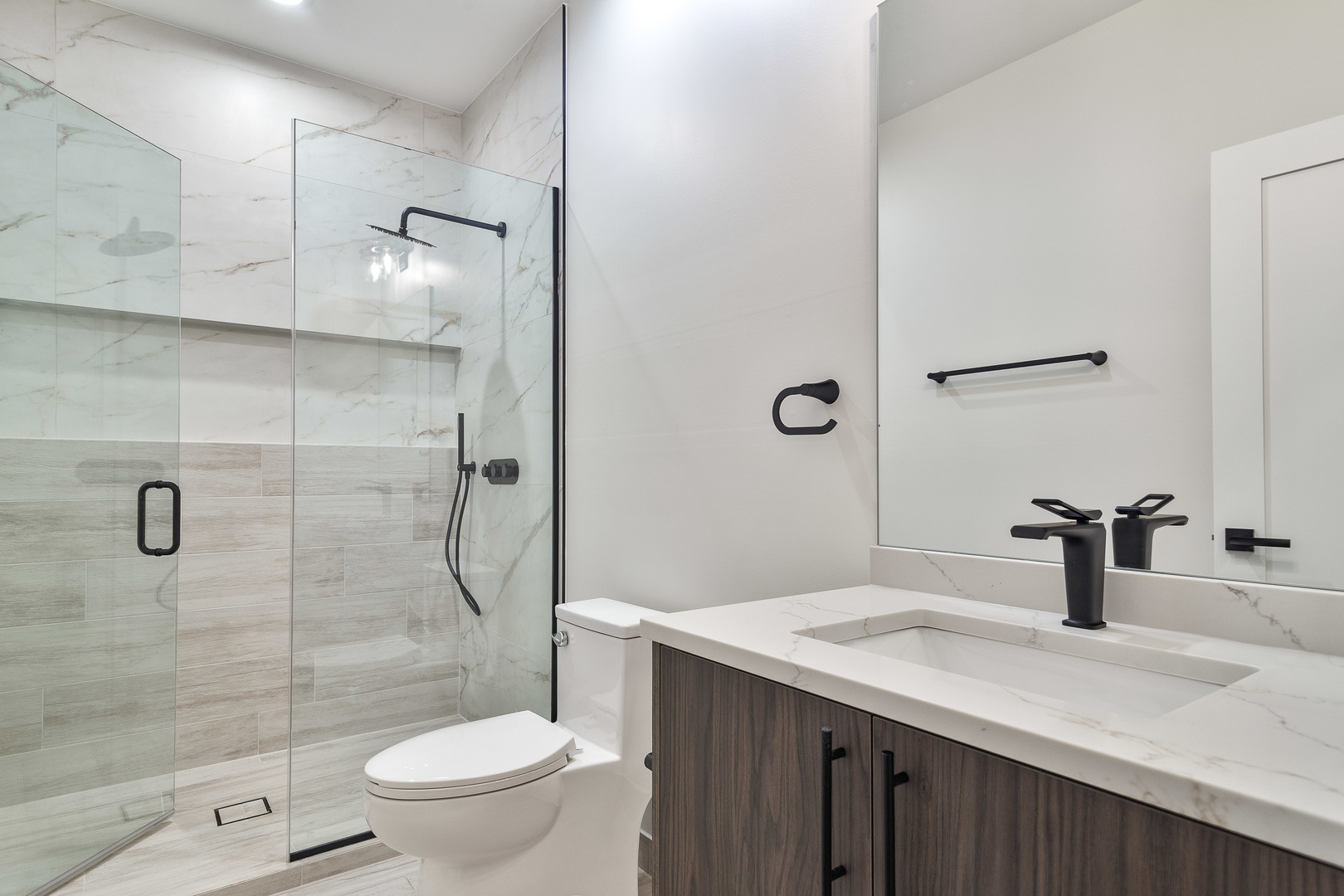 3015 North Normandy Avenue Chicago, IL 60634 - Photo 16 of 28 a bathroom with a sink toilet and shower