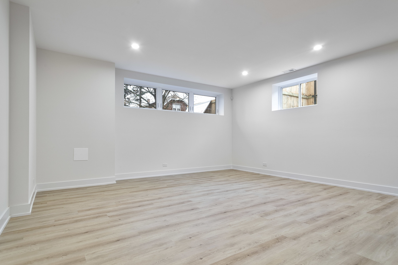 3015 North Normandy Avenue Chicago, IL 60634 - Photo 24 of 28 a view of an empty room with wooden floor