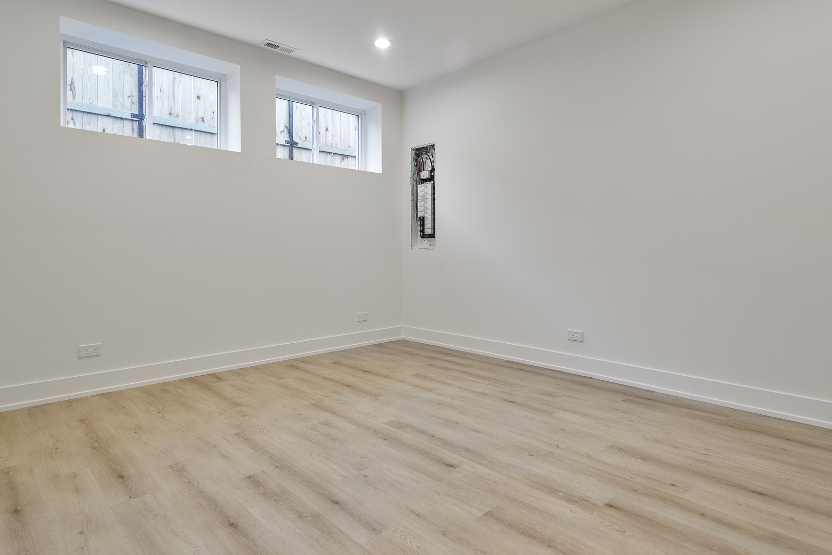 3015 North Normandy Avenue Chicago, IL 60634 - Photo 25 of 28 wooden floor in an empty room