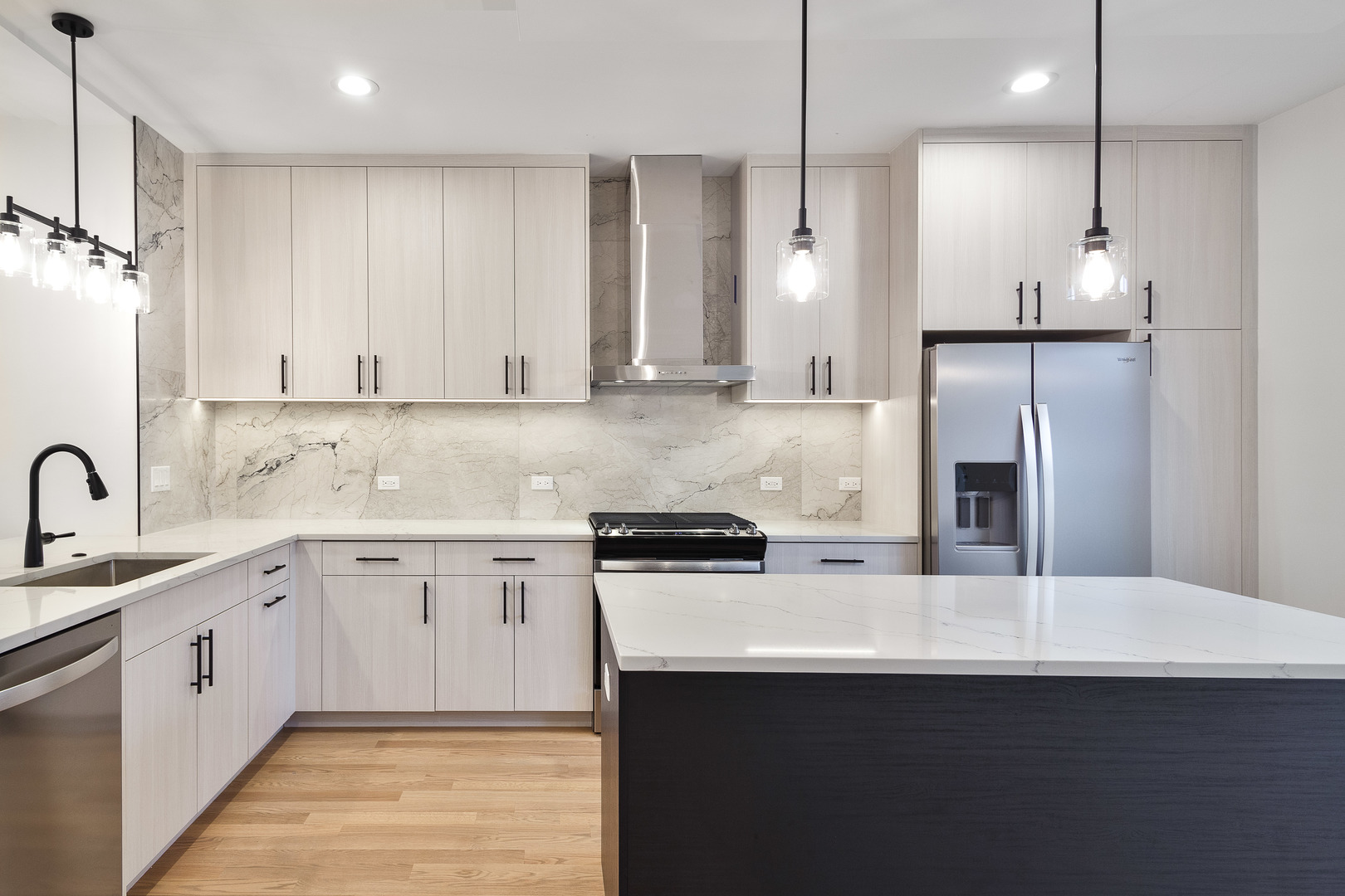 3015 North Normandy Avenue Chicago, IL 60634 - Photo 3 of 28 a kitchen with a sink appliances and cabinets