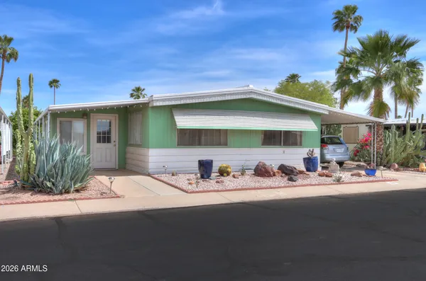 a front view of a house with patio