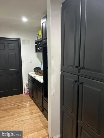 a view of a hallway with windows