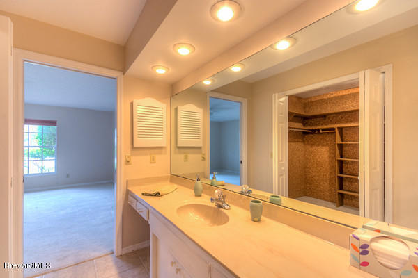 499 Winchester Road Satellite Beach, FL 32937 - Photo 16 of 24 Master Bath and Cedar Lined WIC