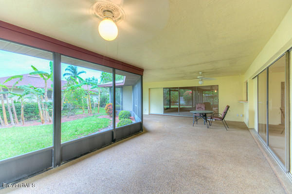499 Winchester Road Satellite Beach, FL 32937 - Photo 23 of 24 Oversized Covered Screened Lanai