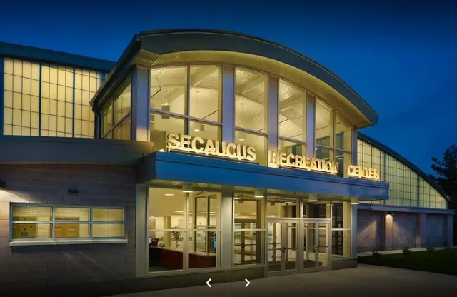 a view of a patio with table and chairs potted plants