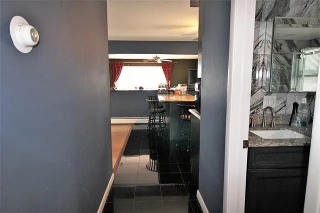 a view of a storage & utility room with a washer dryer