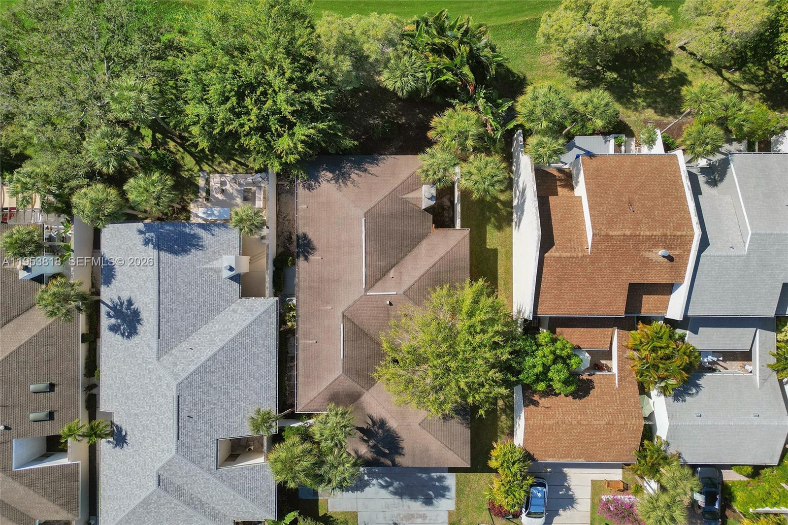 17115 Bay Street Jupiter, FL 33477 - Photo 62 of 73 an aerial view of a house with garden space and street view