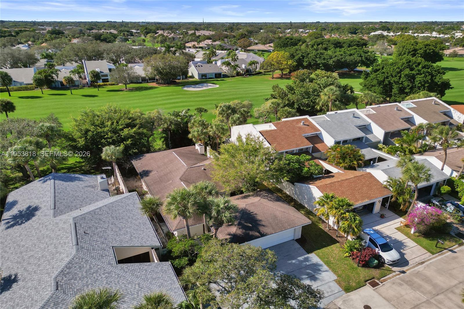 17115 Bay Street Jupiter, FL 33477 - Photo 66 of 73 an aerial view of a house with garden