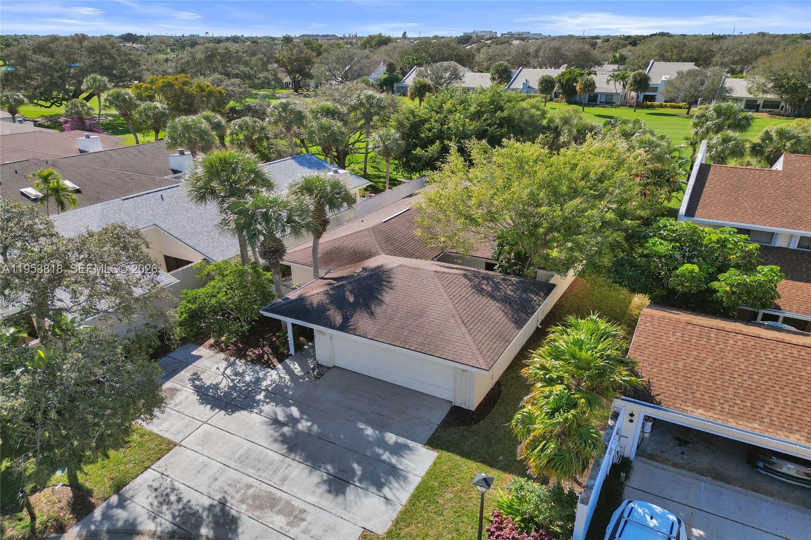 17115 Bay Street Jupiter, FL 33477 - Photo 68 of 73 an aerial view of a house with yard