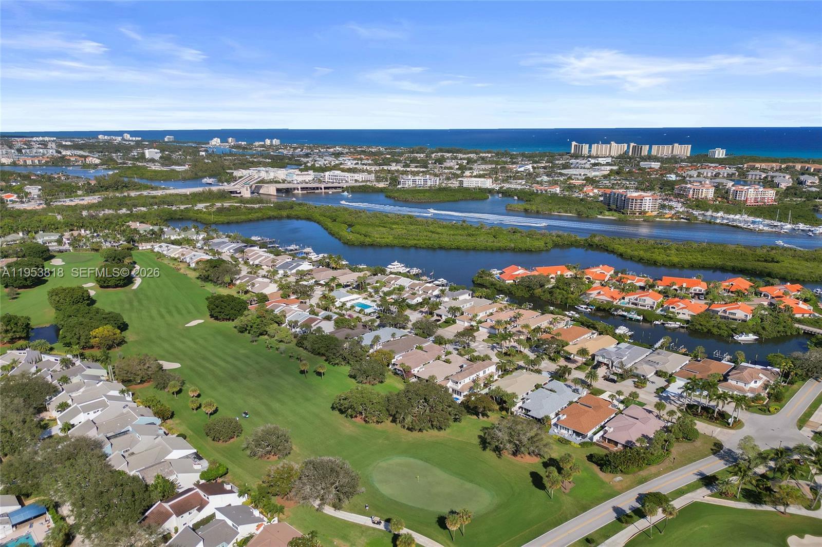 17115 Bay Street Jupiter, FL 33477 - Photo 72 of 73 a view of a city with an ocean view