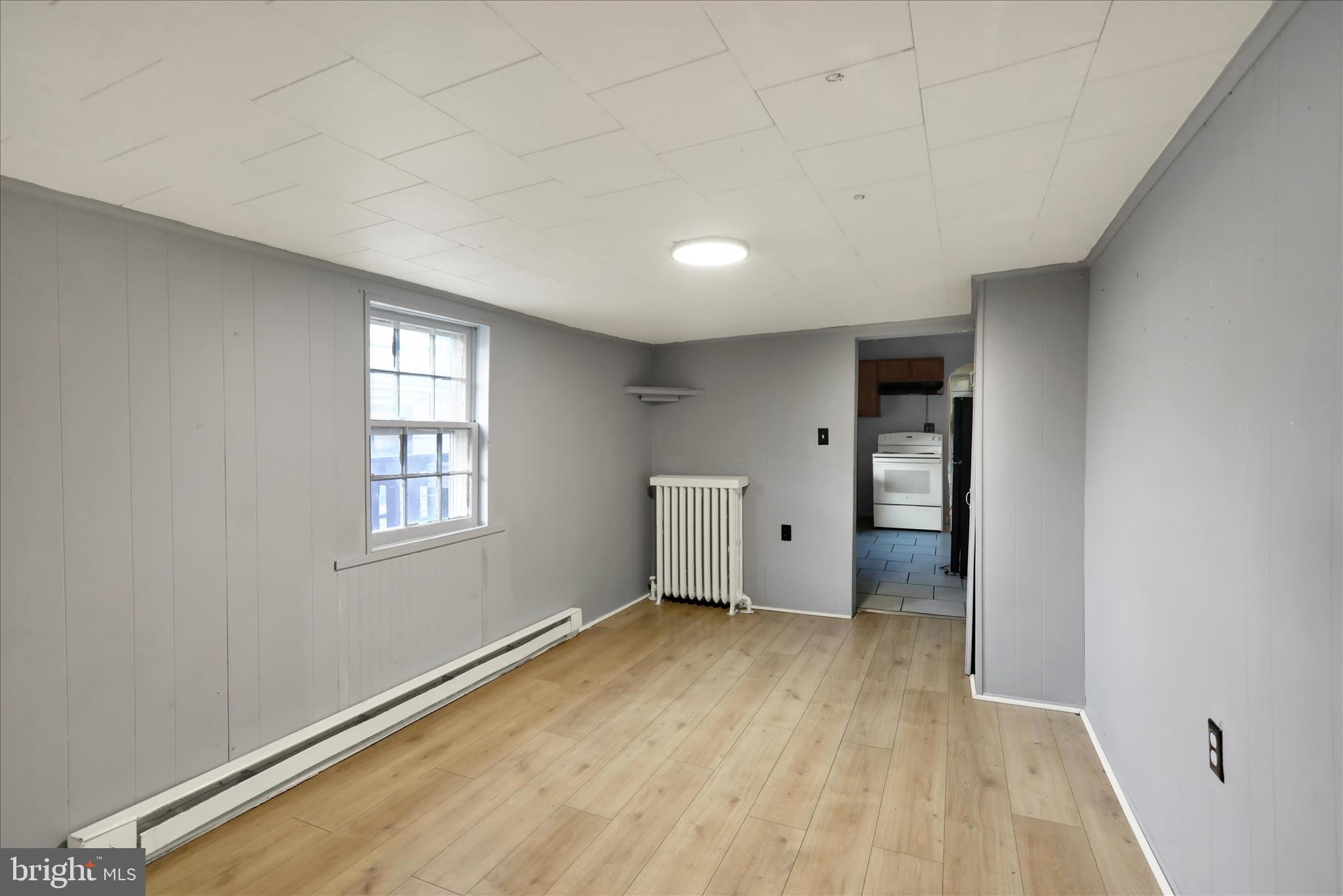 1410 Cotton Street Reading, PA 19602 - Photo 16 of 37 an empty room with windows